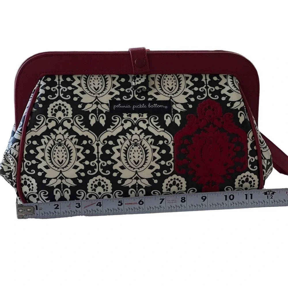 PETUNIA PICKLE BOTTOM red and black diaper changing clutch bag